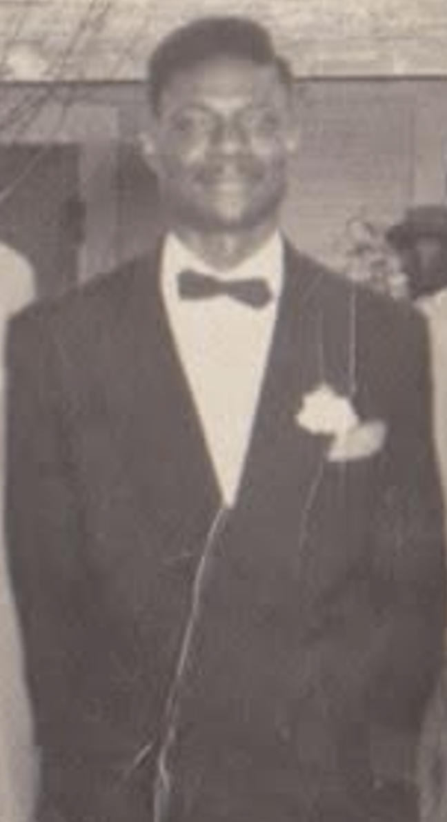 Jason's grandfather, George Breckenridge, in a dark suit, bow tie and boutonniere